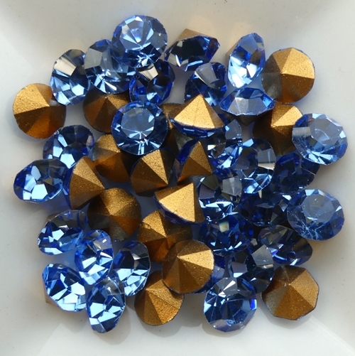 SS29-MCC-30020-98521 Light Sapphire Gold Foiled Chaton 6 mm. 12 Pc.-15350