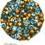 SS29-MCC-60010-98521 Aqua Gold Foiled Chaton 6 mm. 12 Pc.-0