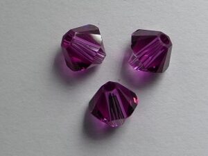 SW-05-FU 5328 Fuchsia Swarovski Bicone 5 mm. 10 Pc.-0