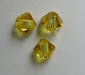 SW-05-TOLT 5328 Light Topaz Swarovski Bicone 5 mm. 10 Pc.-0