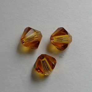 SW-05-TO 5328 Topaz Swarovski Bicone 5 mm. 10 Pc.-0