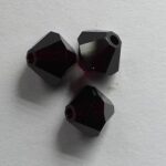 SW-05-GT 5301 Garnet Swarovski Bicone 5 mm. 10 Pc.-0