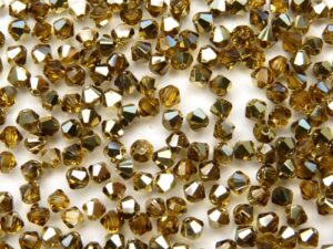 03-MC-10070-26441 Topaz Brass bicones 3 mm 50 stuks