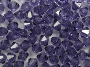 04-MC-20500 Tanzanite bicones 4 mm 50 stuks - Afbeelding 1