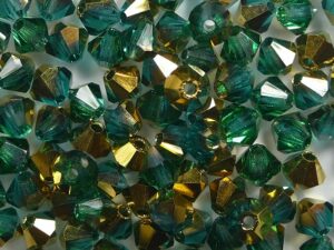 04-MC-60220-26411 Blue Zircon Brass bicones 4 mm 50 stuks