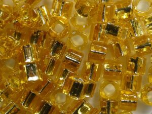 TC-04-0022B Silver Lined Medium Topaz 4 mm Toho Cubes