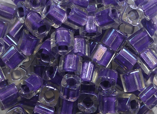 TC-04-0265 toho cubes 4 mm inside color rainbow crystal-metallic purple lined kleurnummer 265