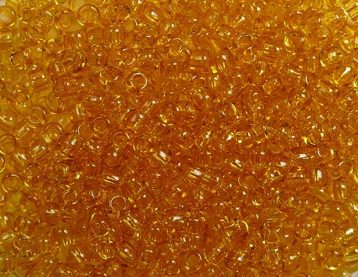 tr-11-0002b toho rocailles transparent med. topaz kleurnummer 2b