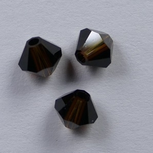 SW-04-MOC 4 mm Mocca Swarovski Element Bicones - Afbeelding 1