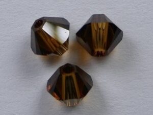 SW-04-TOSMK 4 mm Smoked Topaz Swarovski Element Bicones - Afbeelding 1