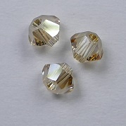 3 mm Crystal Golden Shadow Swarovski Element Bicones - Afbeelding 1
