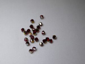 SW-04-SIALTVOL 4 mm Light Siam Volcano Swarovski Element Bicones