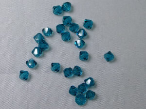 PrBic-04-BLZIR Blue Zircon Preciosa Bicones 4 mm 25 stuks - Afbeelding 1
