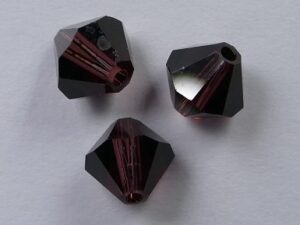 6 mm Burgundy Swarovski Element Bicones - Afbeelding 1