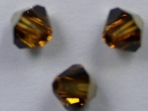 SW-04-TODO 4 mm Topaz Dorado Swarovski Element Bicones - Afbeelding 1