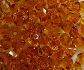 SW-05-TO 5 mm Topaz Swarovski Element Bicones - Afbeelding 2