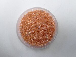 DB-11-0054 Dark Peach Lined Crystal AB Miyuki Delica's 11/0 - Afbeelding 1