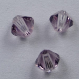 SW-04-AMYLT 4 mm Light Amethyst Swarovski Element Bicones