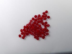 FP1-03-91250 Opal Red Czech Glass Facet Firepolish 3mm 50 stuks - Afbeelding 1