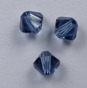 SW-04-DBL 4 mm Denim Blue Swarovski Element Bicones - Afbeelding 1