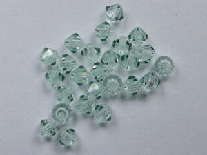 PrBic-04-CHRYS Chrysolite Preciosa Bicones 4 mm 25 stuks