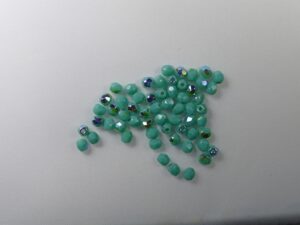 FP1-03-63130X Opaque Turquoise AB Czech Glass Facet Firepolish 3mm 50 stuks - Afbeelding 1