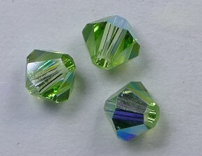SW-04-PERAB 4 mm Peridot AB Swarovski Element Bicones