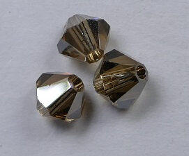 SW-04-SCTOLT 4 mm Satin Light Colorado Topaz Swarovski Element Bicones - Afbeelding 1