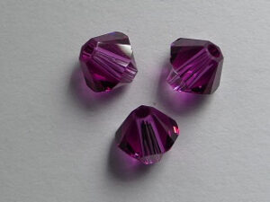SW-05-FU 5 mm Fuchsia Swarovski Element Bicones - Afbeelding 1