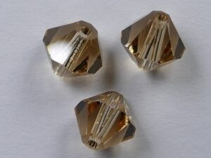 6 mm Light Colorado Topaz Swarovski Element Bicones - Afbeelding 1