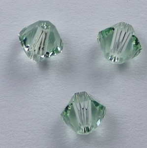 SW-04-CHRYSO 4 mm Chrysolite Swarovski Element Bicones