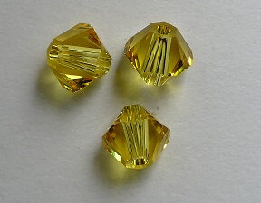 SW-05-TOLT 5 mm Light Topaz Swarovski Element Bicones - Afbeelding 1