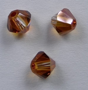 SW-04-CRYSCOP 4 mm Copper Swarovski Element Bicones