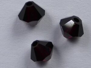 SW-04-GT 4 mm Garnet Swarovski Element Bicones - Afbeelding 1