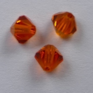 SW-04-TORE 4 mm Red Topaz Swarovski Element Bicones