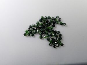 FP1-03-26507 Green w/Black Czech Glass Facet Firepolish 3mm 50 stuks