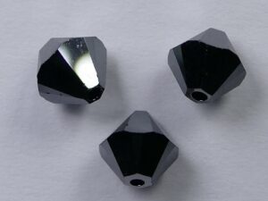 6 mm Jet Hematite 2x Swarovski Element Bicones - Afbeelding 1