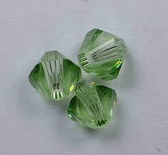 SW-05-PER 5 mm Peridot Swarovski Element Bicones - Afbeelding 1