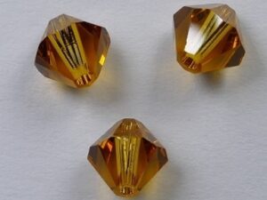 6 mm Topaz Swarovski Element Bicones