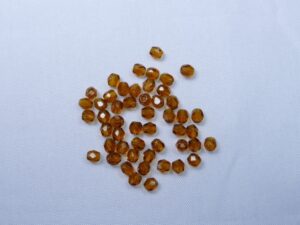 FP1-03-10100 Dark Topaz Czech Glass Facet Firepolish 3mm 50 stuks - Afbeelding 1