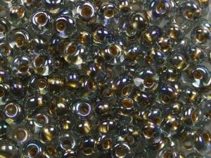 TM-03-0999 Gold Lined Rainbow Black Diamond Magatama 3 mm. TOHO