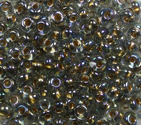 TM-03-0999 Toho magatama 3 mm gold lined rainbow black diamond