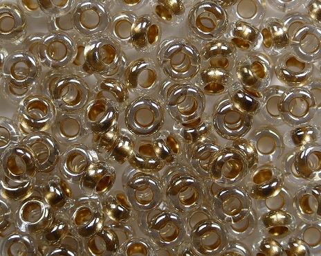 TN-06-0989 toho demi round 6-0 gold lined crystal