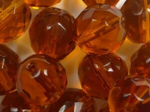 FP1-10-10090 Dark Topaz Czech Glass Facet Firepolish 10mm 10 stuks