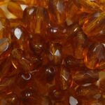 0030327 6×4 mm faceted olive dark topaz