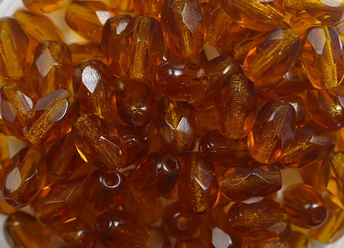 0030327 6×4 mm faceted olive dark topaz