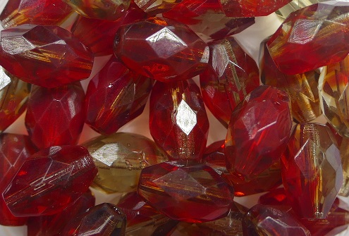 0050292 9x6 mm facetted olive crystal garnet-ruby melee