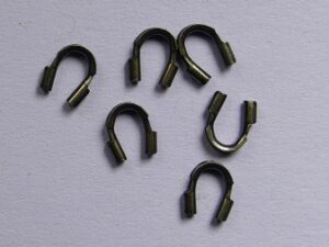 0160234 Draadbeschermers, Wire Protectors Antique Brass Plated 20 stuks
