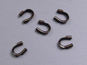 0160235 Draadbeschermers, Wire Protectors Antique Copper Plated 20 stuks