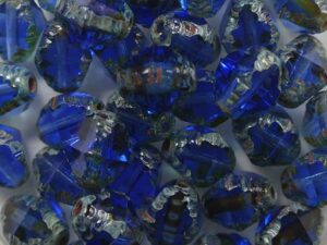 0090434 Transparent Sapphire Picasso Special Cut Firepolished Bicones 8x6 mm. 12 Pc.